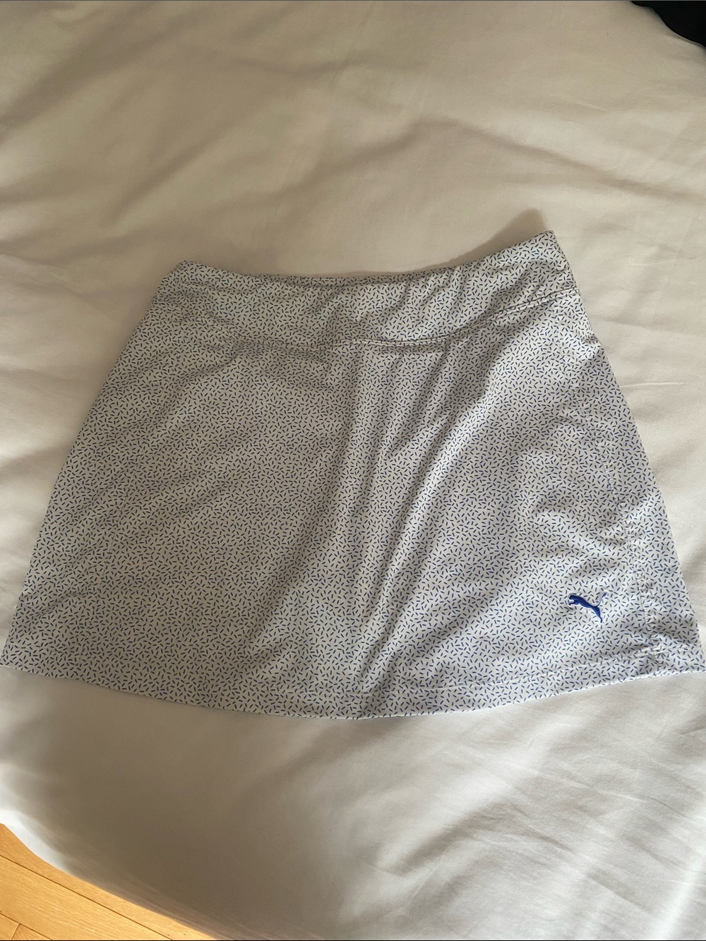 Puma White Mini Skirt with Navy Logo and Micro Pattern